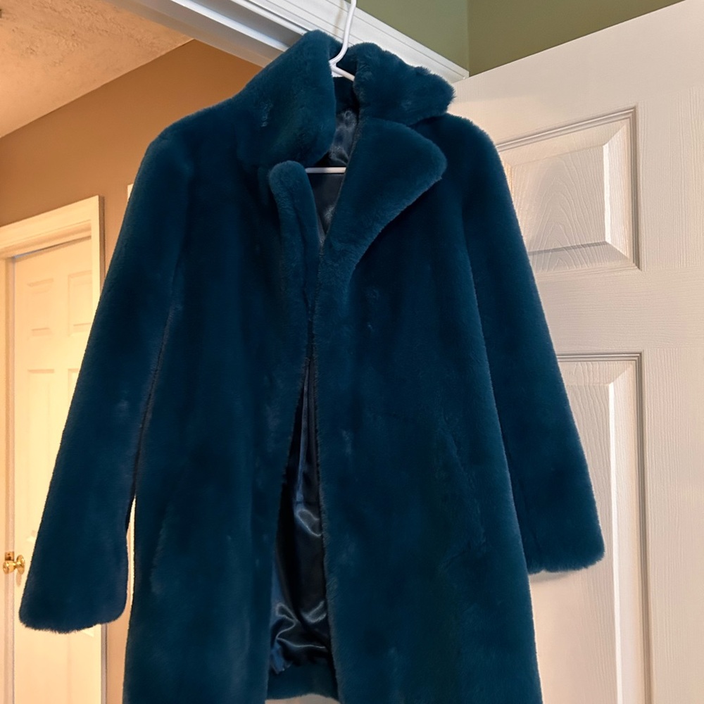 Donna Salyers Fabulous Furs Turquoise jacket.